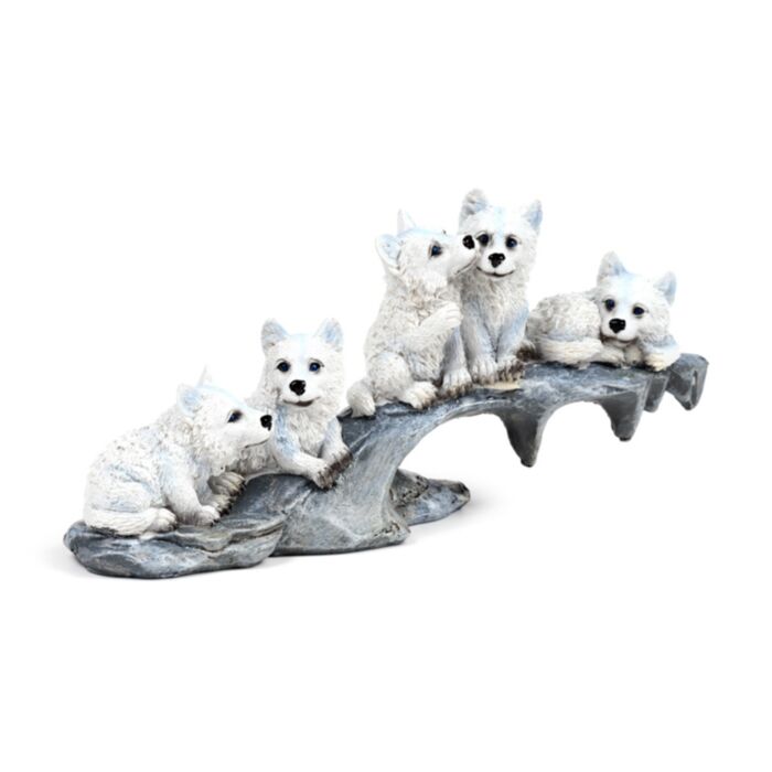 Wolf Puppies Playing on Stone Outcrop