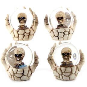 Skull Snow Globe in Skeleton Hand Snow Globe Skull Snow Globe in Skeleton Hand Snow Globe